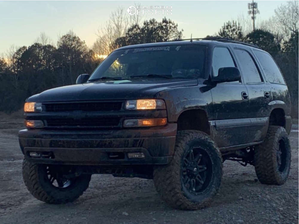 2002 Chevrolet Tahoe with 20x10 -18 Fuel Hostage and 35/12.5R20 AMP Mud  Terrain Attack Mt A and Suspension Lift 6" | Custom Offsets