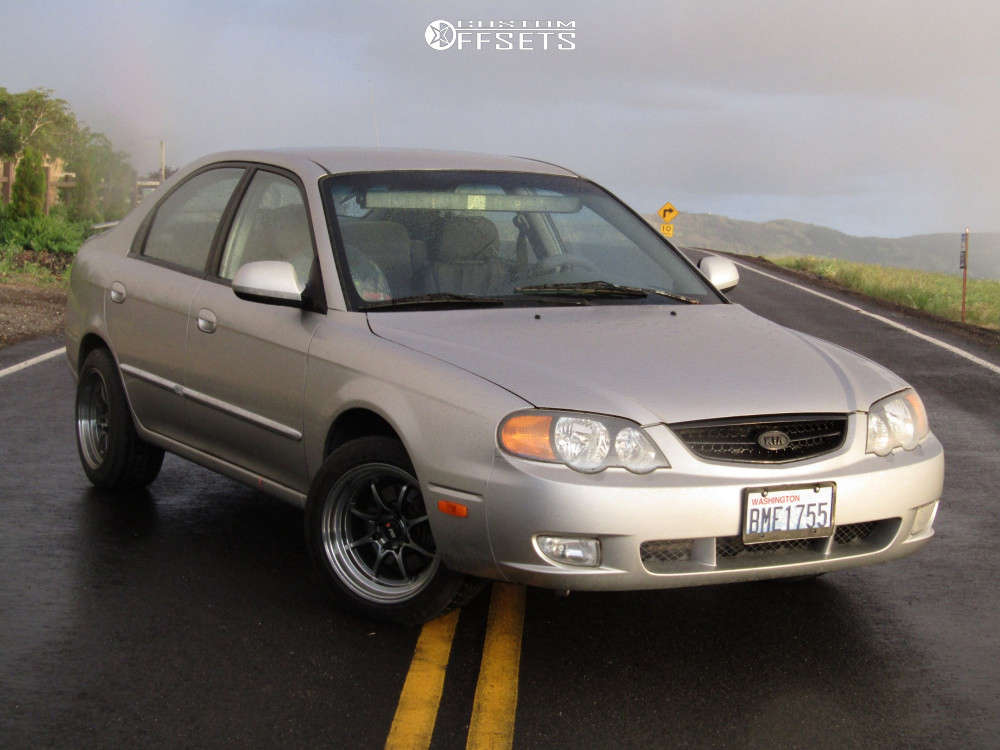 2002 Kia Spectra with 15x8 25 F1R F03 and 205/50R15 Toyo Tires Proxes ST  III and Stock | Custom Offsets