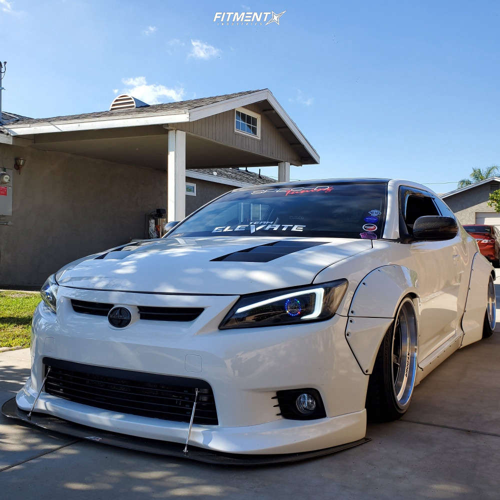 2012 Scion TC Base with 18x11 Cosmis Racing XT-006R and Accelera 235x45 on  Air Suspension | 869495 | Fitment Industries