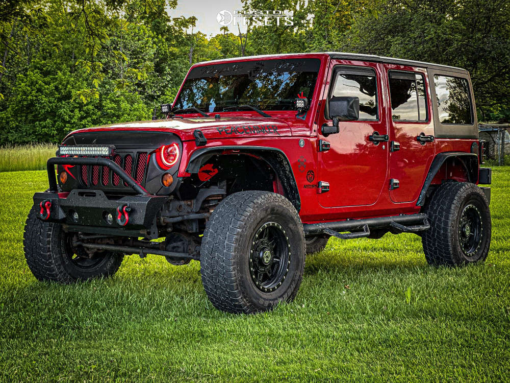 2011 Jeep Wrangler with 17x9 -12 Anthem Off-Road Rogue and 35/12.5R17  Hercules Terra Trac A/t and Suspension Lift 2.5" | Custom Offsets