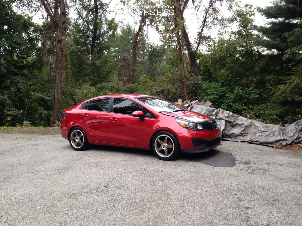 2013 Kia Rio with 17x7 45 Enkei Ev5 and 225/45R17 Toyo Tires Extensa Hp Ii  and Lowering Springs | Custom Offsets