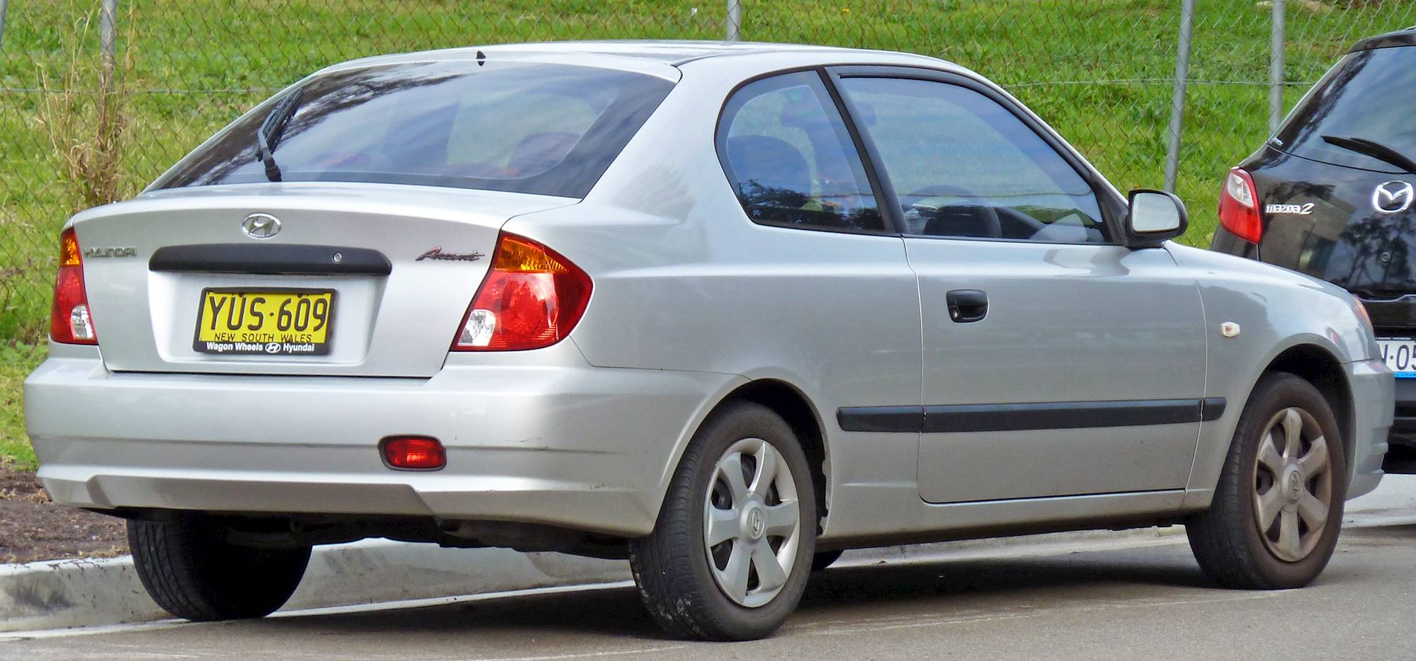 2003 Hyundai Accent Base w/Side Impact Air Bags 2dr Hatchback 5-spd manual  w/OD