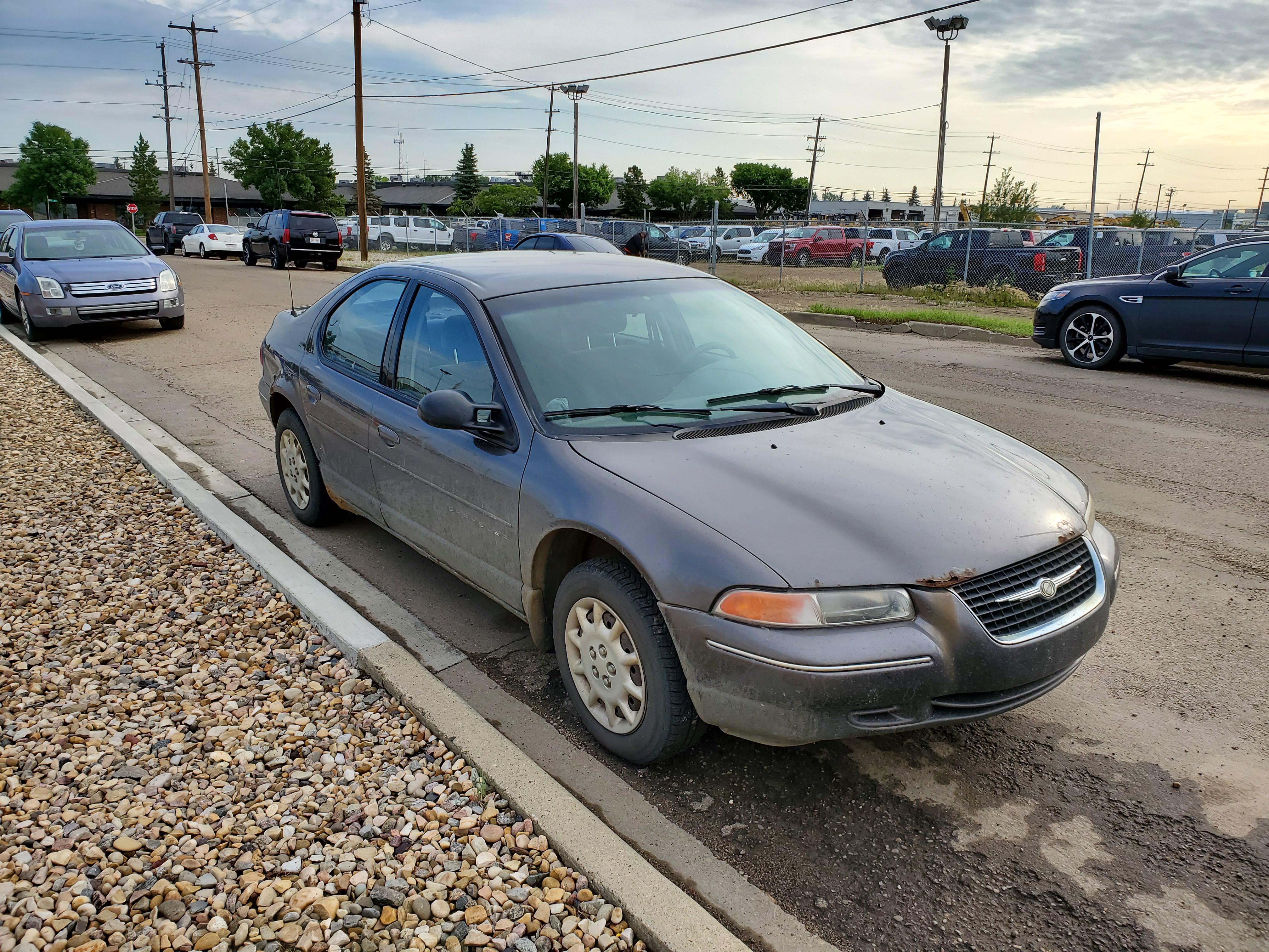 2000 Chrysler Cirrus, it wants to die as bad as I do. Running on 3  cylinders, pissing oil, burning coolant. Let it burn : r/RoastMyCar