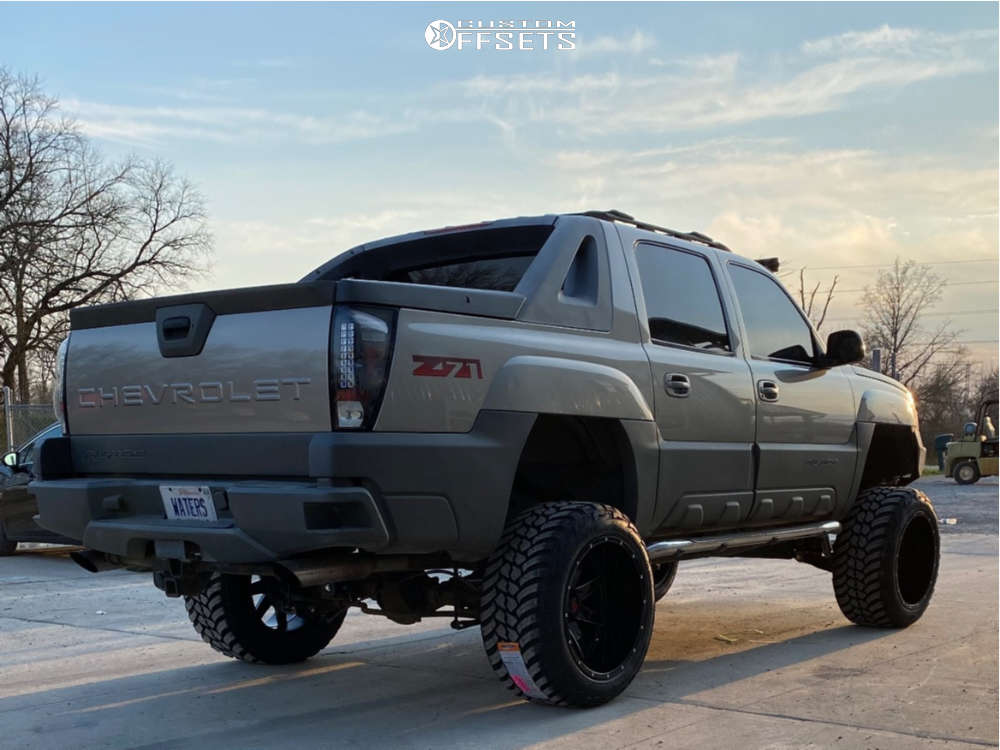 2002 Chevrolet Avalanche 1500 with 22x14 -76 Havok H112 and 325/50R22 AMP  Mud Terrain Attack Mt A and Suspension Lift 6" & Body 3" | Custom Offsets