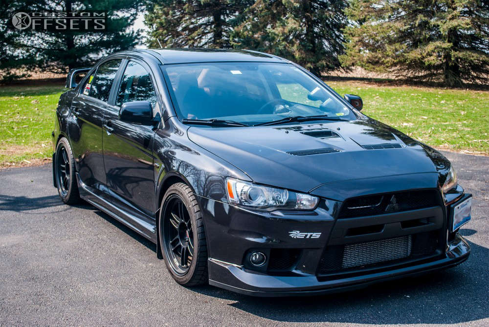 2012 Mitsubishi Lancer with 18x9.5 15 Enkei RPF1 and 265/35R18 BFGoodrich  G-force T/a Kdw and Lowering Springs | Custom Offsets
