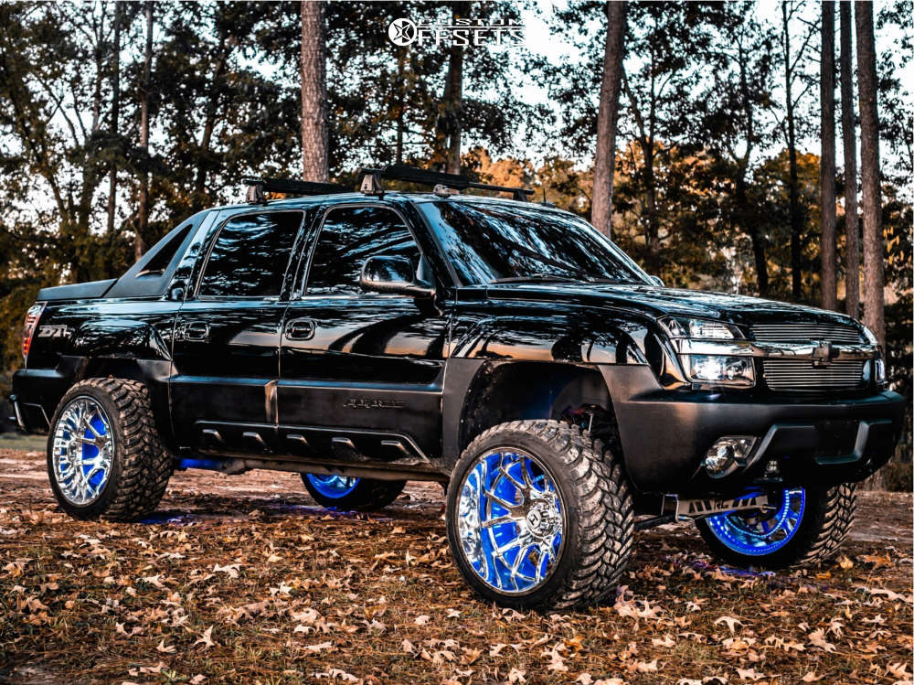 2003 Chevrolet Avalanche with 24x14 -76 Hostile H113 and 35/13.5R24 AMP Mud  Terrain Attack Mt A and Suspension Lift 6" | Custom Offsets