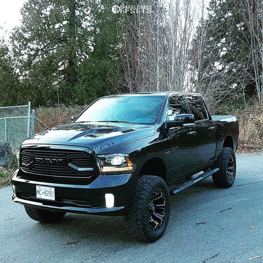 2018 Ram 1500 with 20x10 -18 Fuel Assault and 35/12.5R20 Nitto Ridge  Grappler and Suspension Lift 6" | Custom Offsets