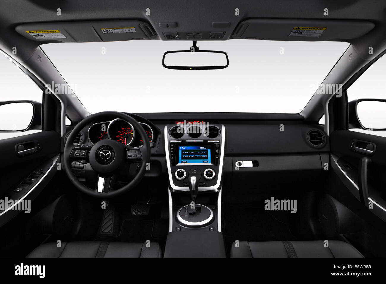 2009 Mazda CX-7 Grand Touring in Gray - Dashboard, center console, gear  shifter view Stock Photo - Alamy