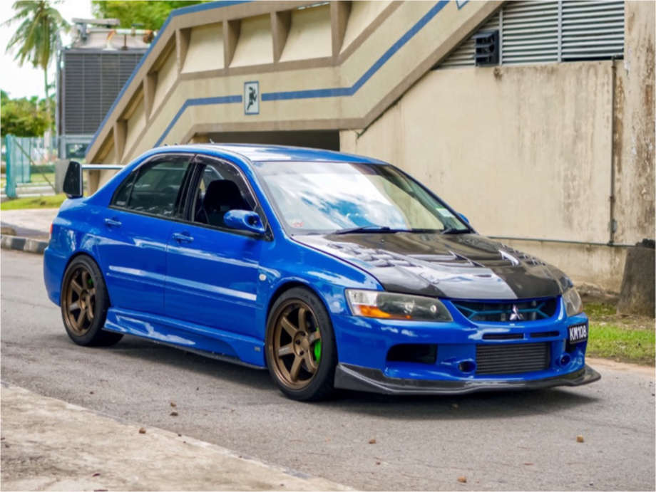 2002 Mitsubishi Lancer with 18x9.5 22 Rays Engineering Te37 and 245/40R18  Bridgestone Potenza Re-71r and Coilovers | Custom Offsets