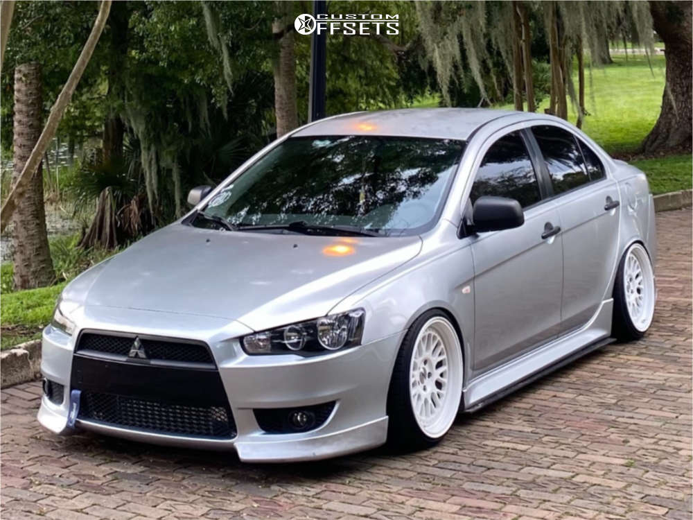 2010 Mitsubishi Lancer with 18x9.5 22 Whistler Sk1 and 215/35R18 Nitto Neo  Gen and Coilovers | Custom Offsets
