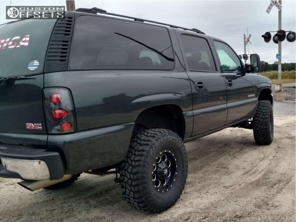 2003 GMC Yukon XL 1500 with 16x8 1 Fuel Revolver and 315/75R16 Cooper  Discoverer Stt Pro and Suspension Lift 6" | Custom Offsets